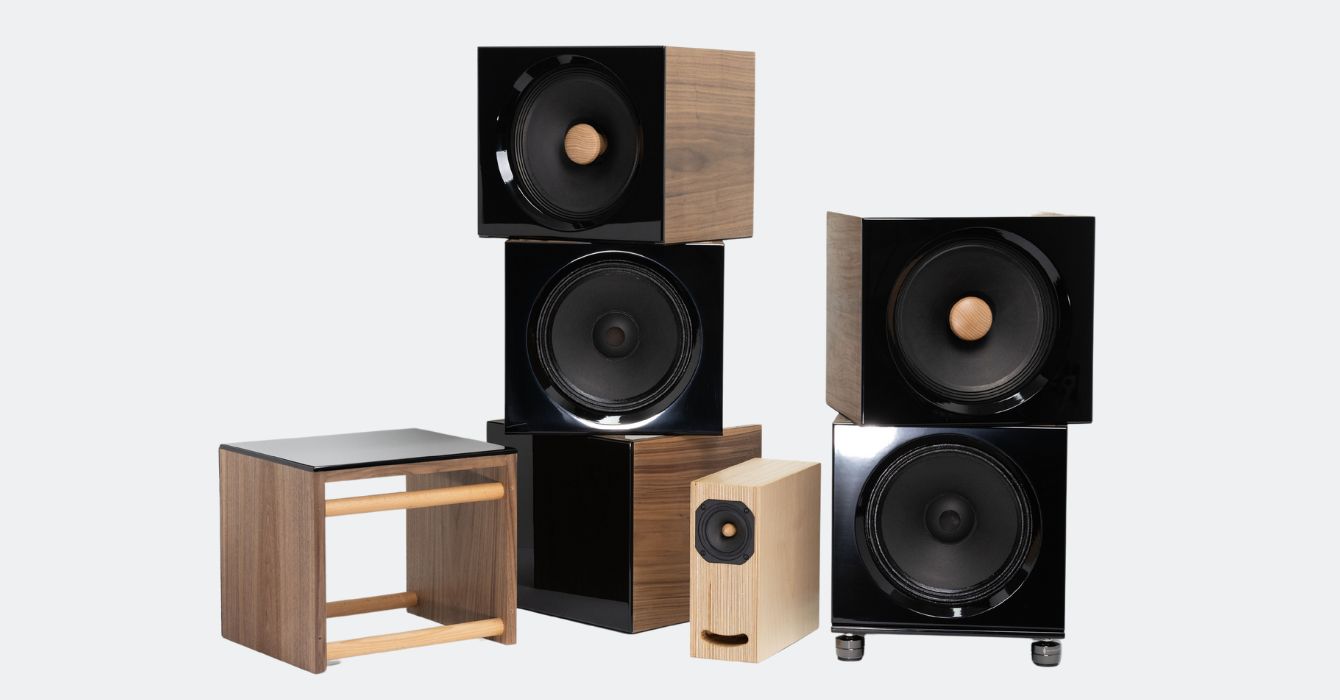 Closer Acoustics Blocks scattered, showcasing different speaker components and configurations.