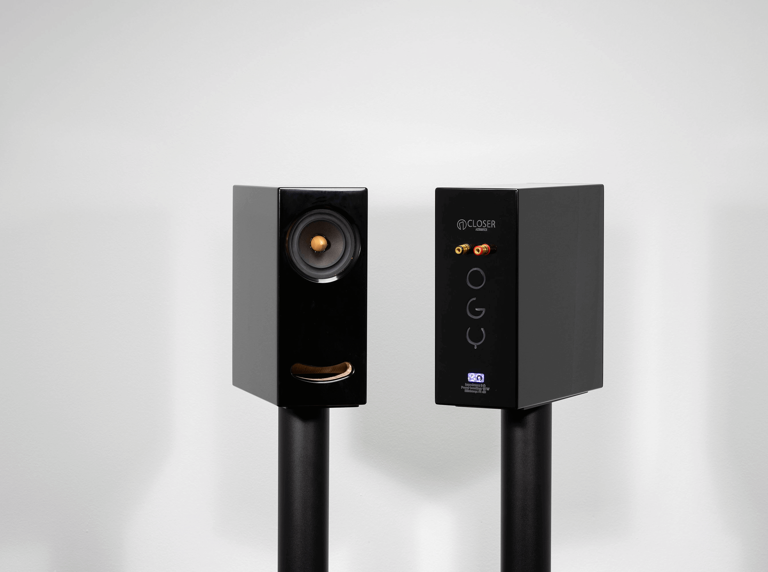Detailed close-up of the Closer Acoustics OGY black speaker with Corian finish, highlighting the smooth texture and refined craftsmanship