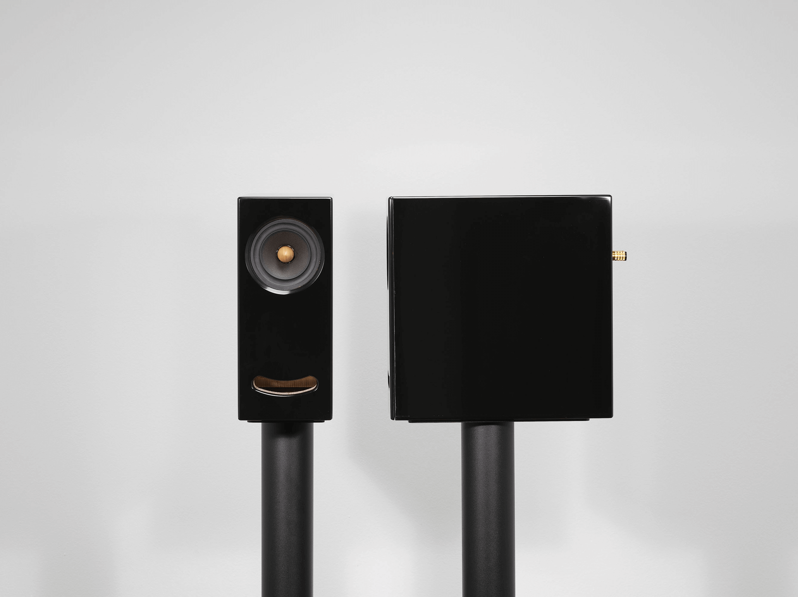 Closer Acoustics OGY black Corian speaker with seamless design, perfect for audiophiles looking for both style and sound quality