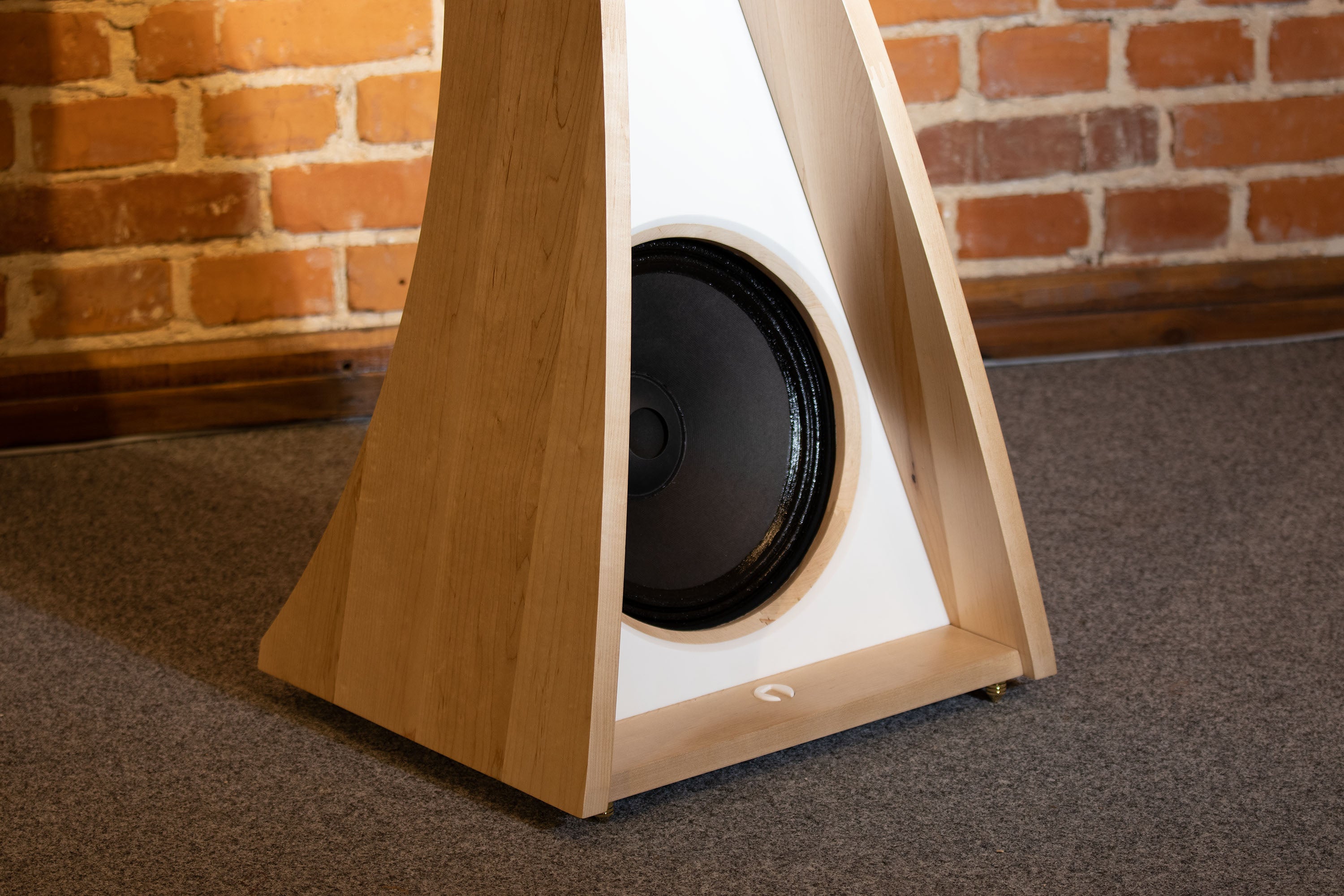 Close-up view of the bass driver on the Closer Acoustics OGY Loudspeaker, showcasing the high-performance components and precise engineering for deep, rich sound