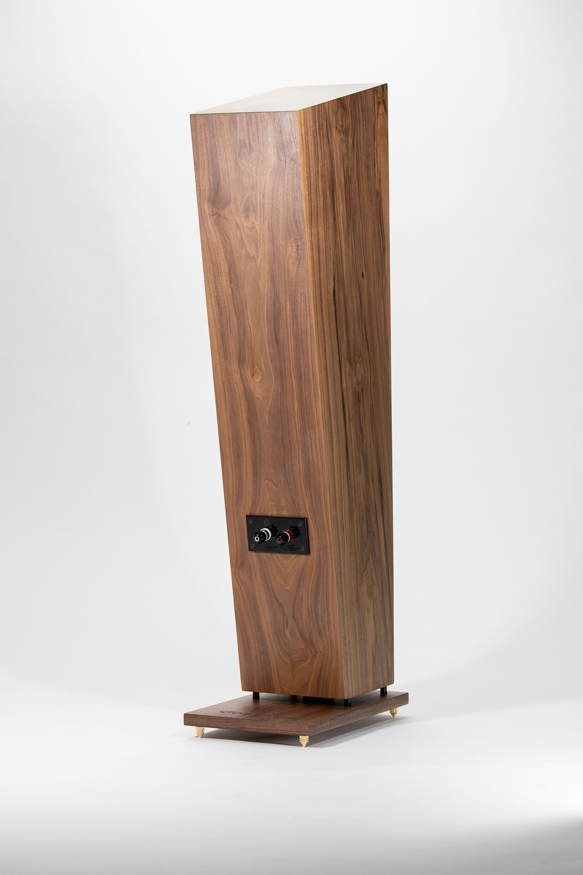 Forlane full range speakers in walnut veneer finish, showcasing a sleek, modern design with premium craftsmanship.