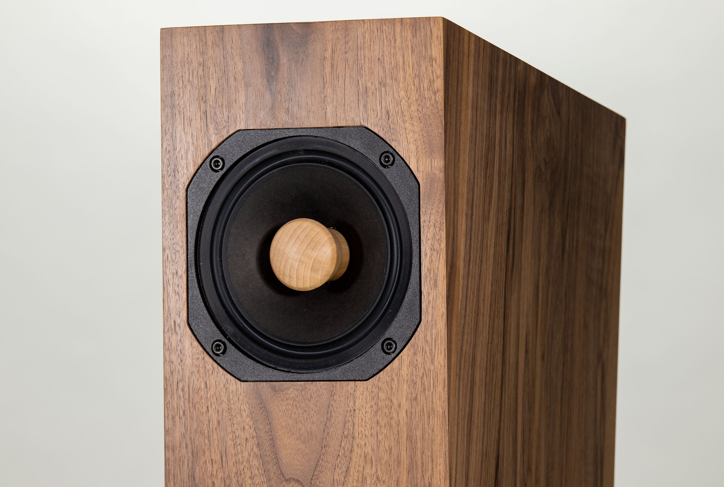 Closer Acoustics Forlane full range speakers in walnut veneer finish, showcasing high-quality transducer design.