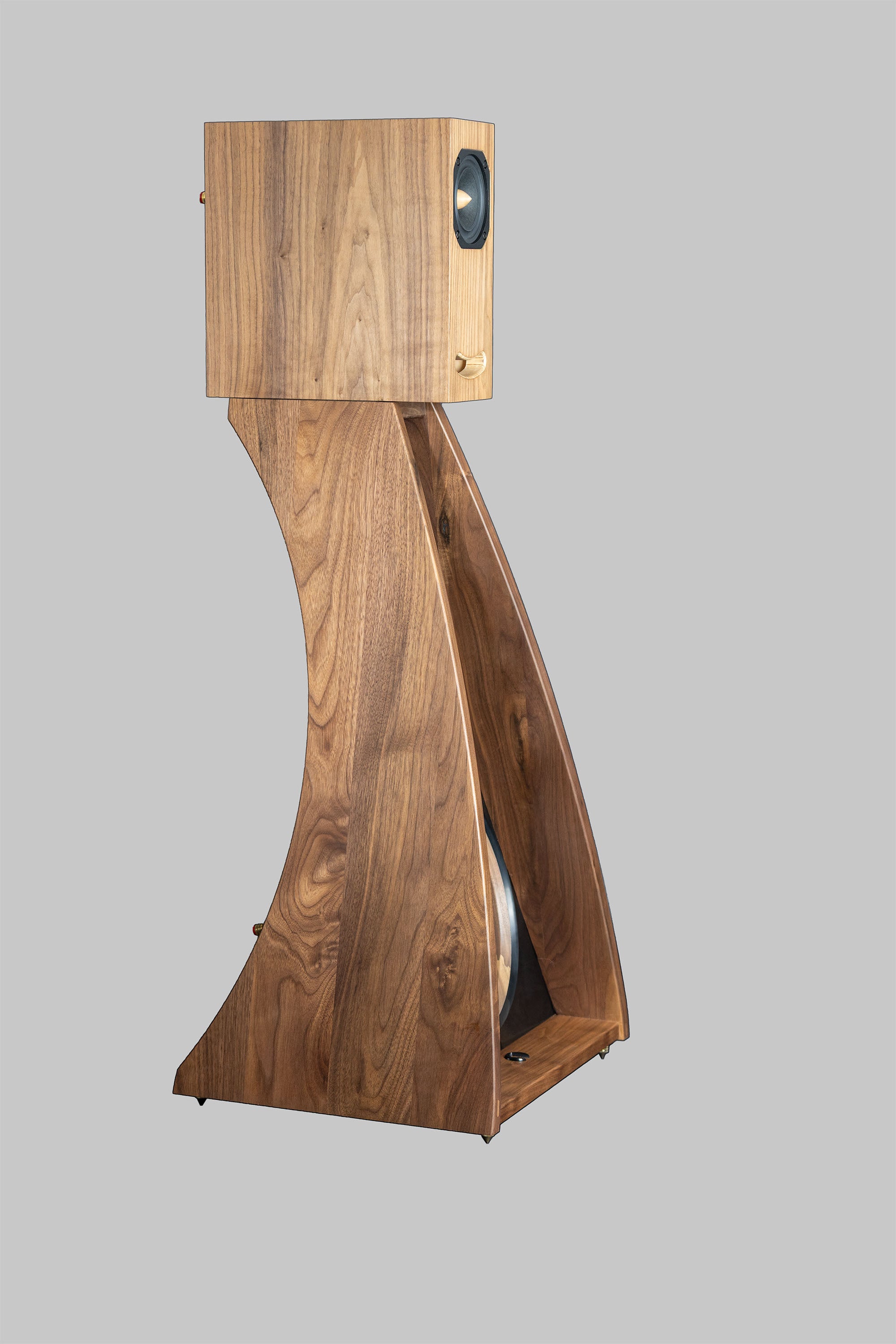 Side view of Closer Acoustics OGY Bass Artisan Series speaker in solid American walnut with Corian front