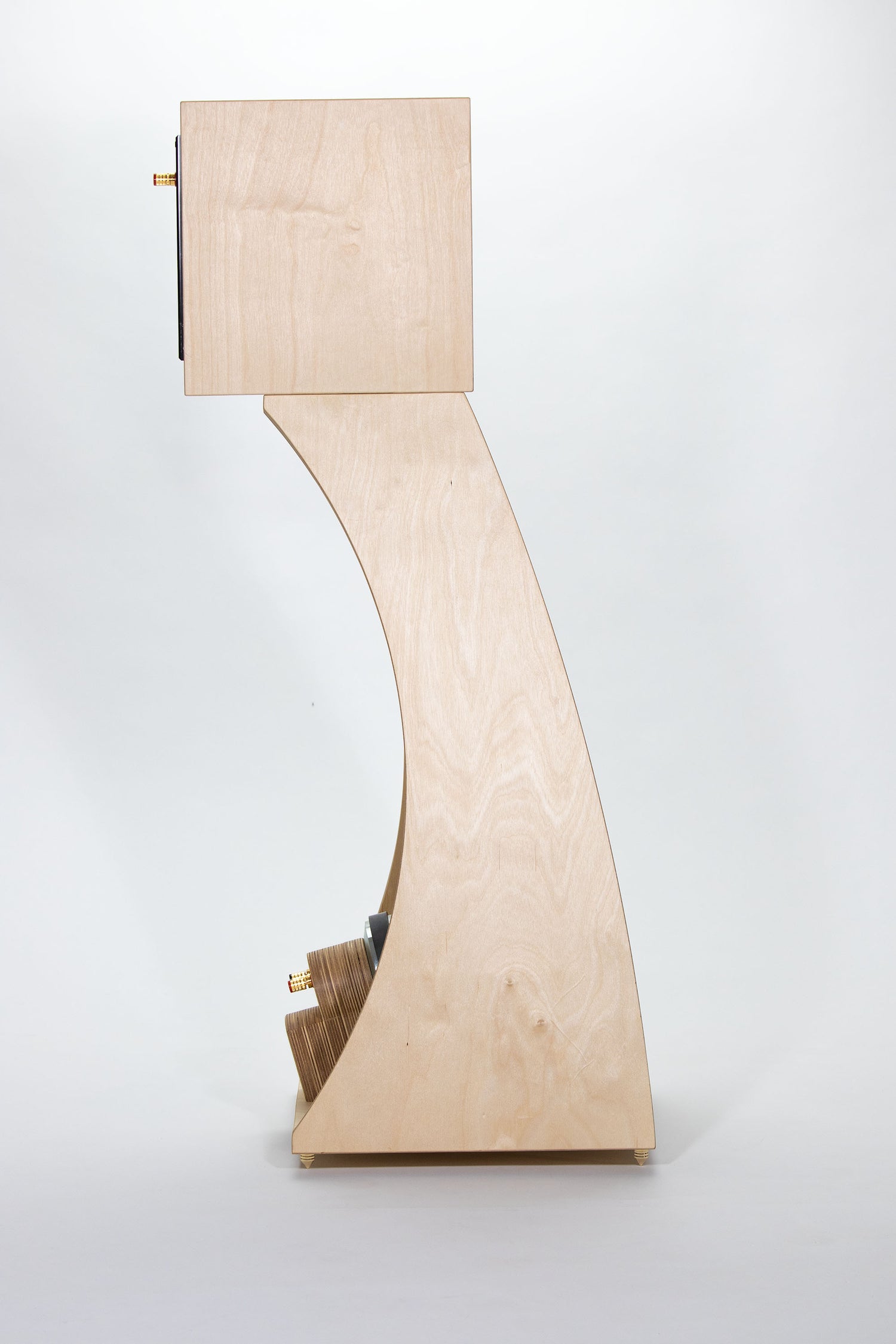 Closer Acoustics The Full OGY Bass module with birch plywood finish, showcasing elegant design and craftsmanship.