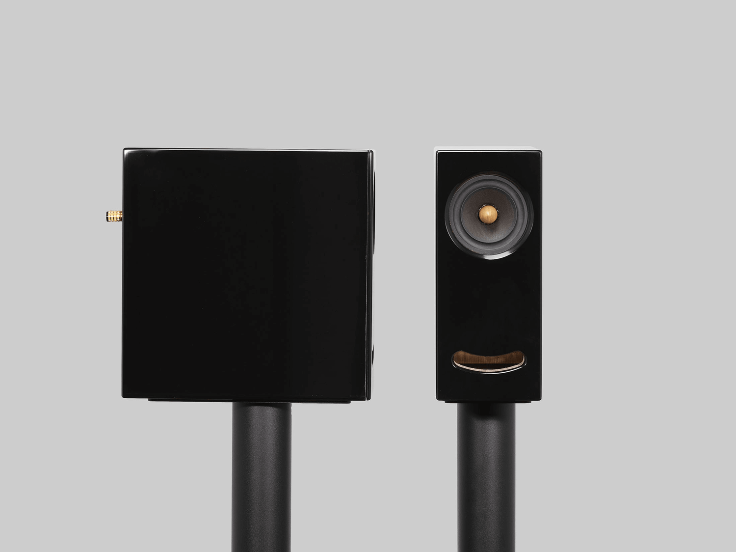 Side view of the Closer Acoustics OGY black Corian speaker – showcasing its premium build and distinctive smooth finish
