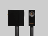 Side view of the Closer Acoustics OGY black Corian speaker – showcasing its premium build and distinctive smooth finish