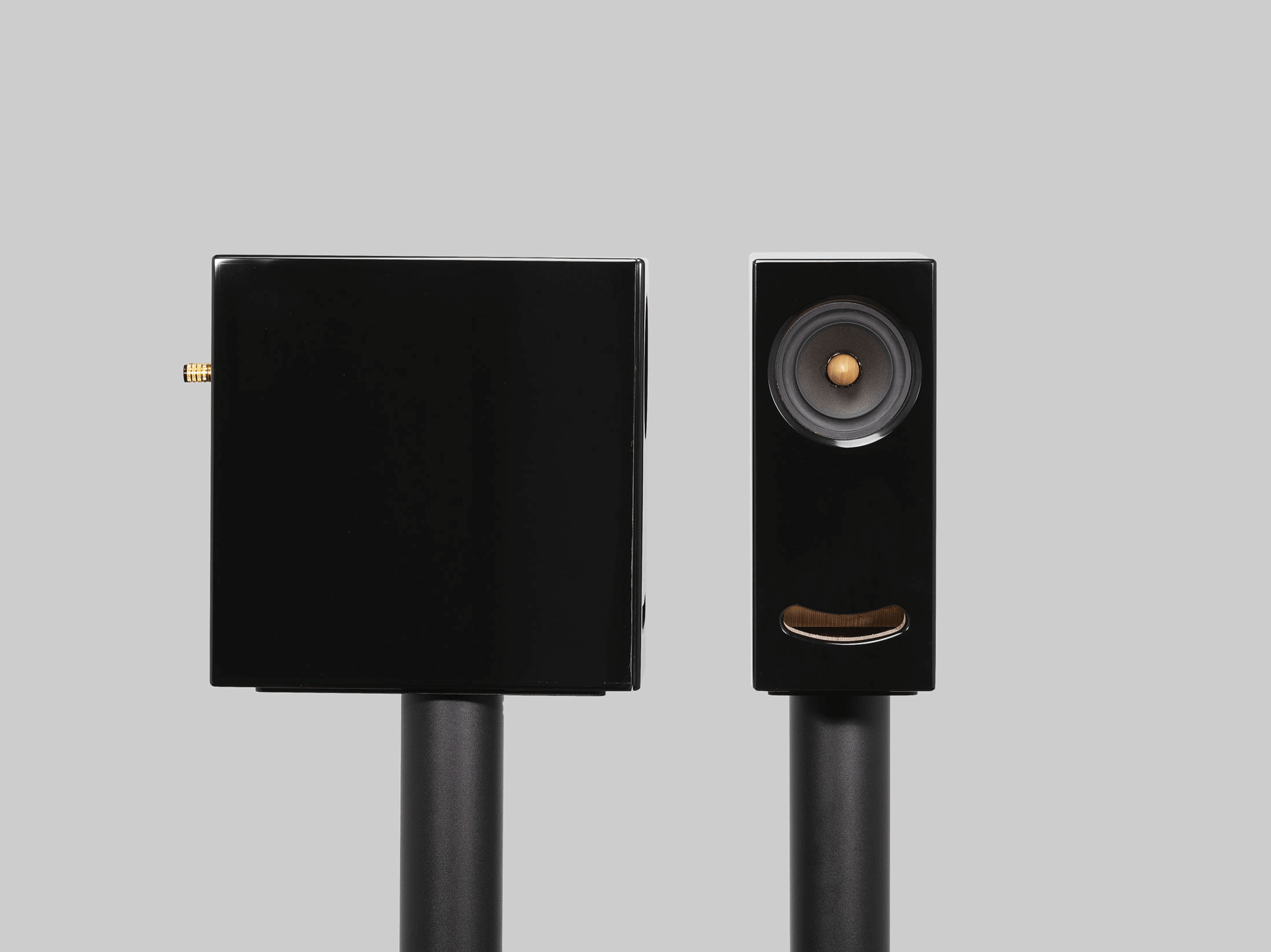 Side view of the Closer Acoustics OGY black Corian speaker – showcasing its premium build and distinctive smooth finish