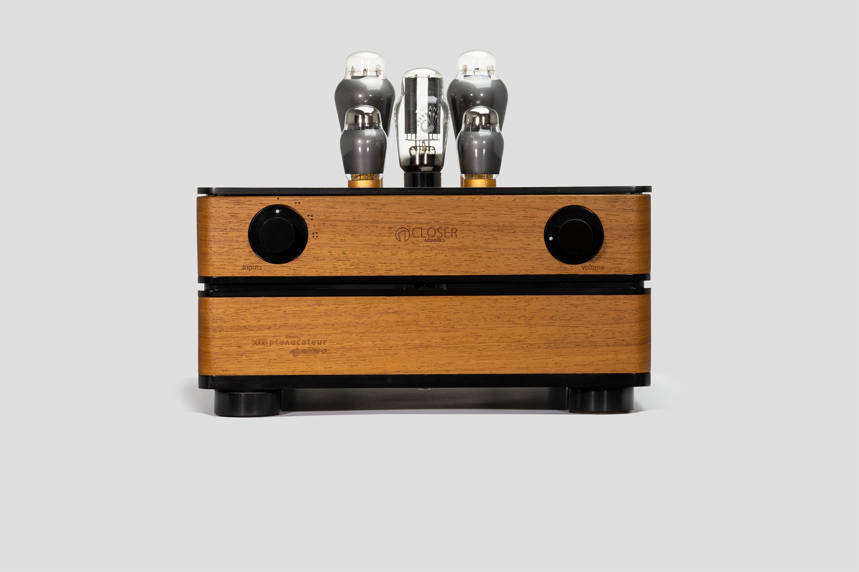 En face front view of the Closer Acoustics 300B Provocateur Signature integrated amplifier in Iroko finish, emphasizing its stunning appearance and craftsmanship.