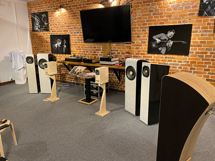 nside the Closer Acoustics showroom – showcasing premium speakers, amplifiers, and audio systems in a luxurious setting.