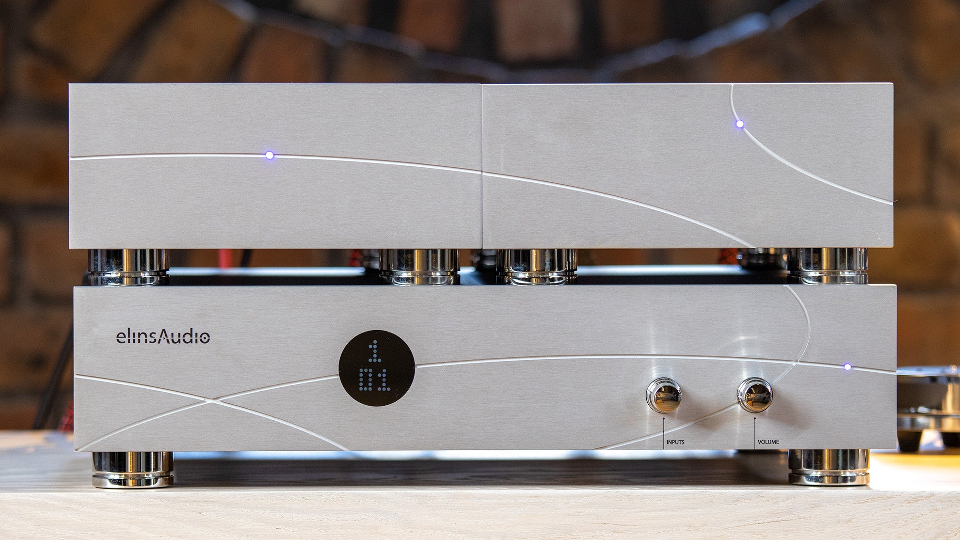 Overall view of the elinsAudio Mille Reference amplifier, displaying its elegant design and high-end audio equipment aesthetic.
