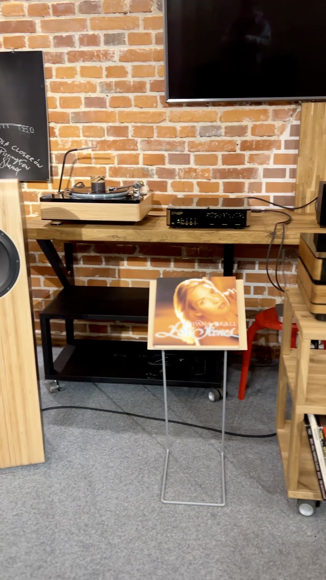 urntable playing calm jazz music, featuring a vinyl record setup in a relaxed listening environment, creating a soothing and immersive listening experience.