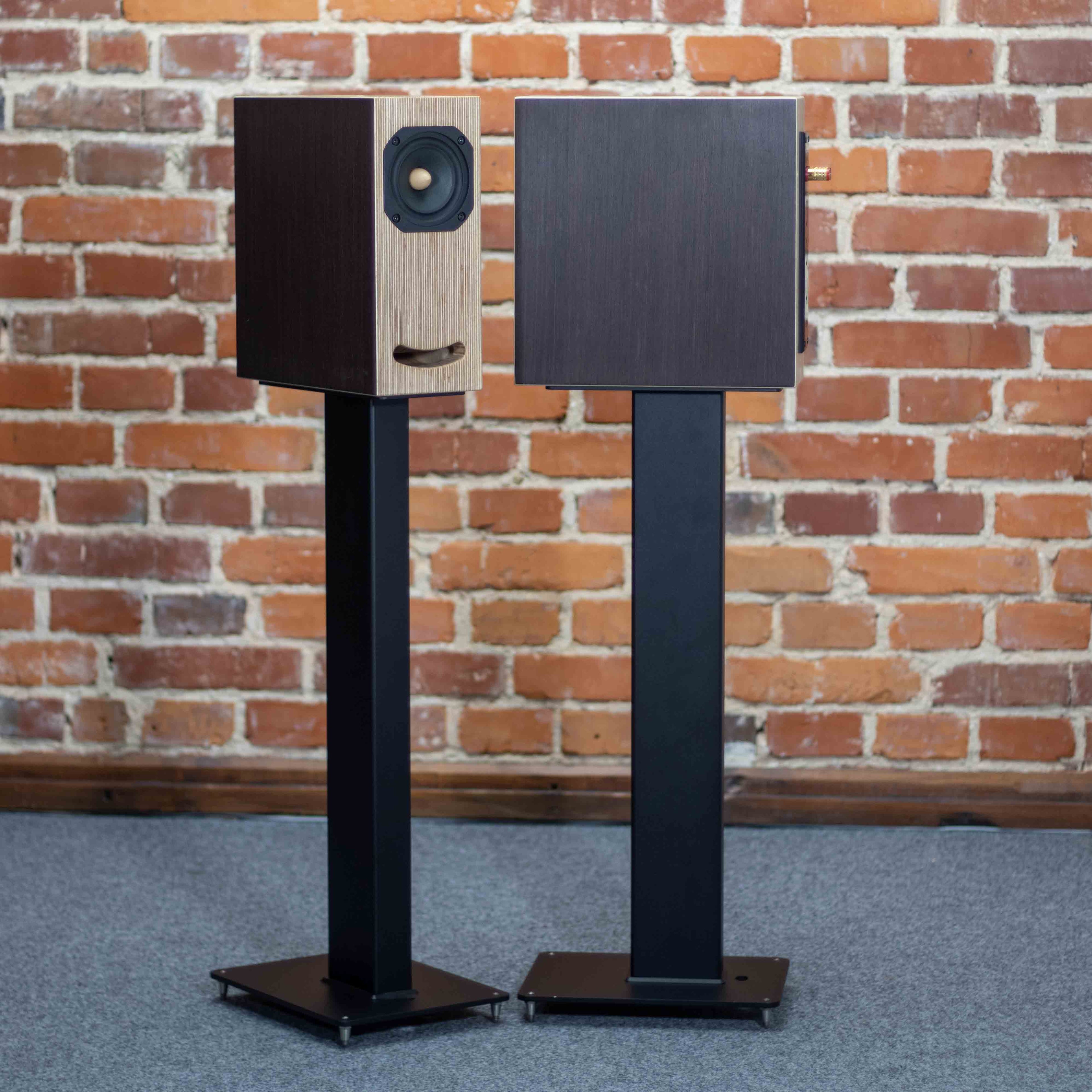OGY Wenge veneer loudspeakers on stands in various listening positions