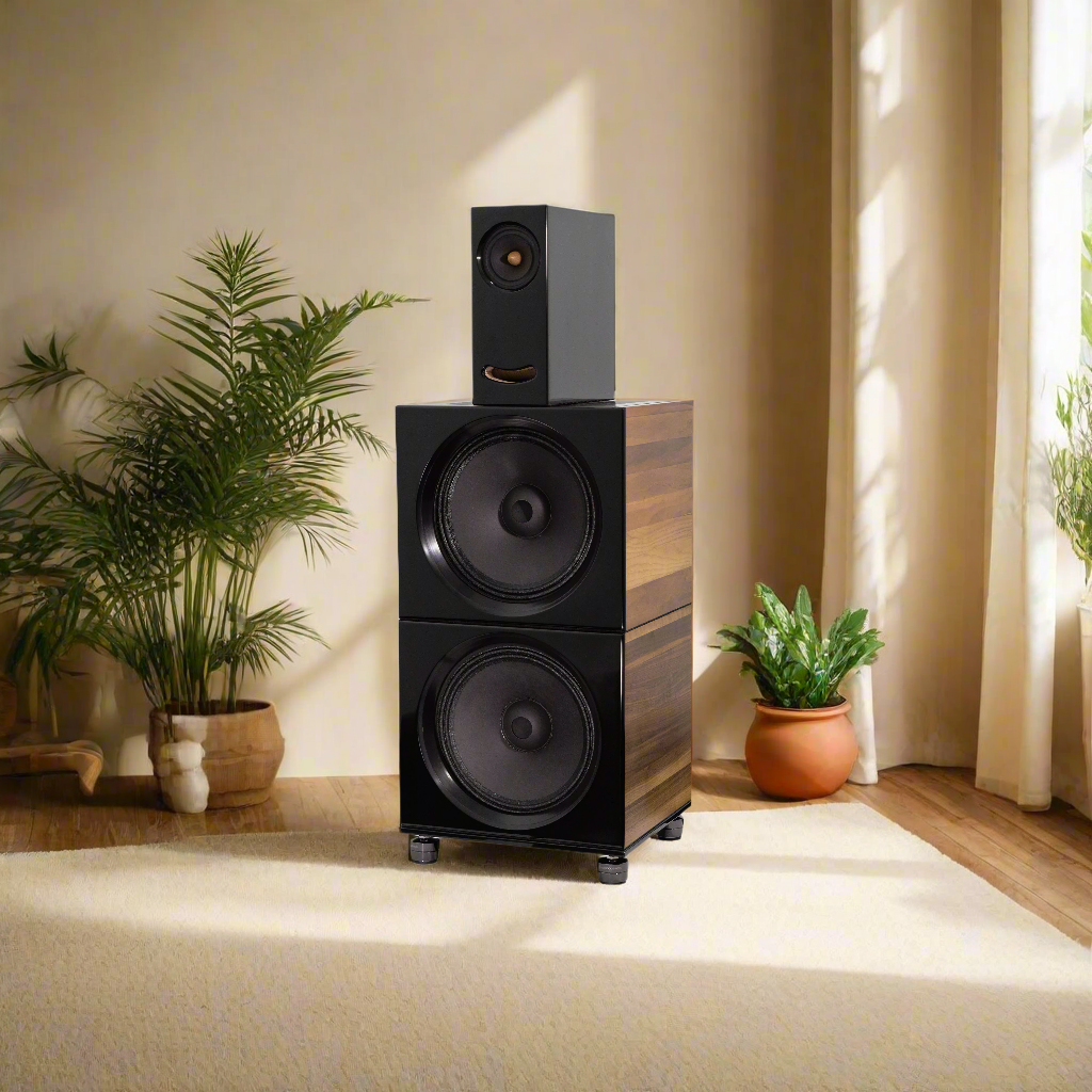Closer Acoustics loudspeakers displayed in a stylish listening room, highlighting their elegant design and audio performance.
