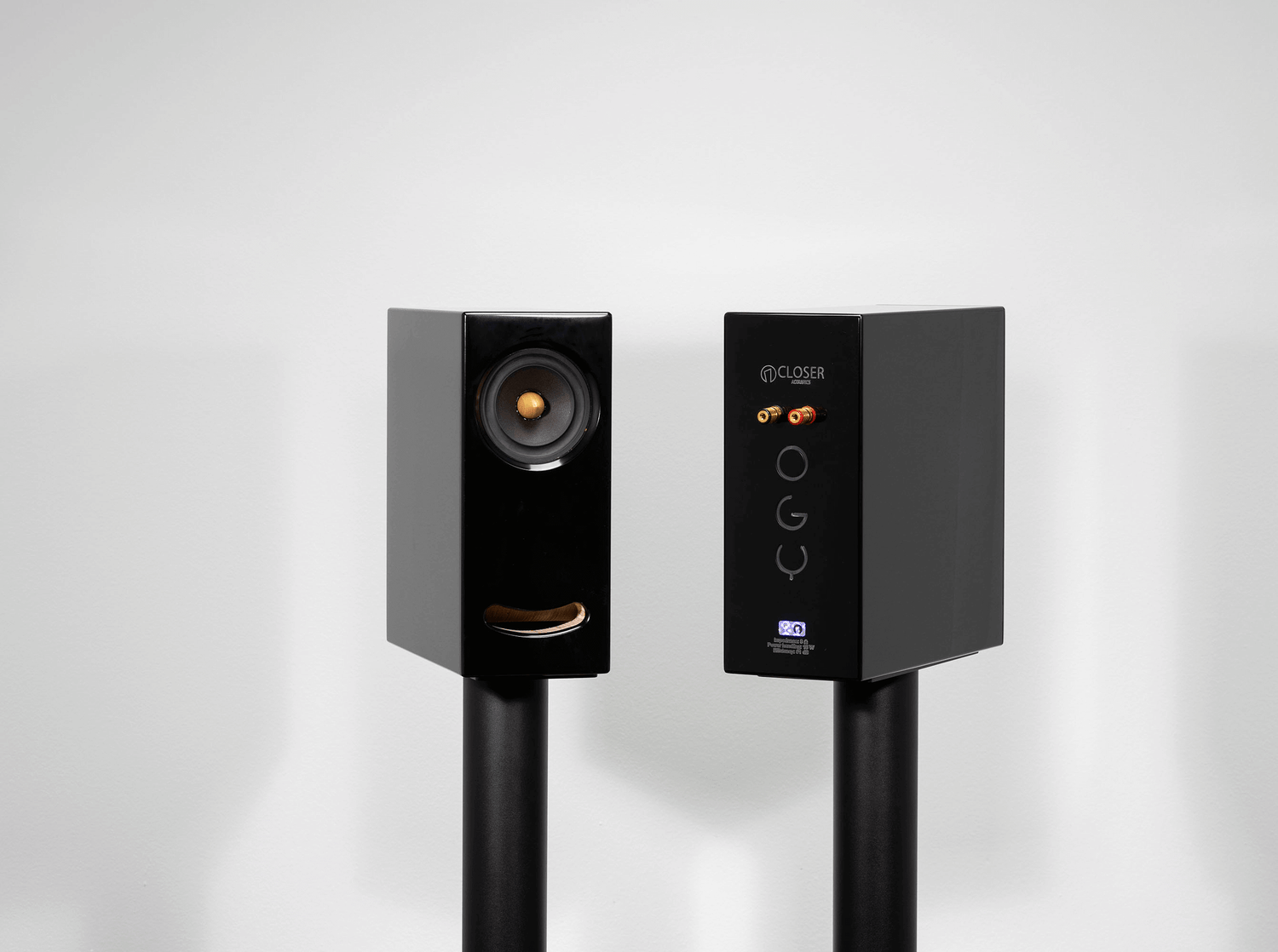 Detailed close-up of the Closer Acoustics OGY black speaker with Corian finish, highlighting the smooth texture and refined craftsmanship