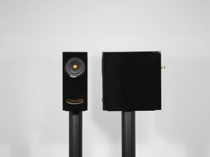 Closer Acoustics OGY black Corian speaker with seamless design, perfect for audiophiles looking for both style and sound quality