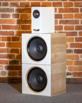 Side view from the other angle of the Closer Acoustics OGY plus 2 x BOBs set, emphasizing the premium craftsmanship and maple veneer details