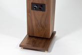 Close-up of the rear panel of the Closer Acoustics Forlane loudspeaker in walnut veneer finish, showcasing the detailed craftsmanship and connections.