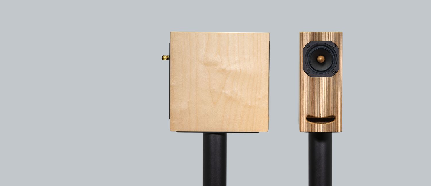 Plywood full range loudspeakers on black stands
