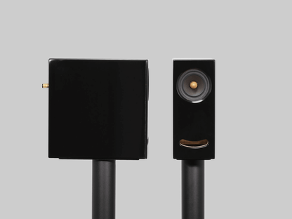 Side view of the Closer Acoustics OGY black Corian speaker – showcasing its premium build and distinctive smooth finish