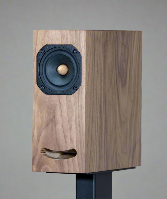Closer Acoustics OGY walnut veneer loudspeaker – close-up view showcasing the natural wood grain and premium craftsmanship for audiophile sound