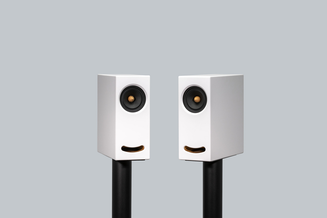 OGY White Corian speakers – showcasing the high-end craftsmanship and clean design of Closer Acoustics.