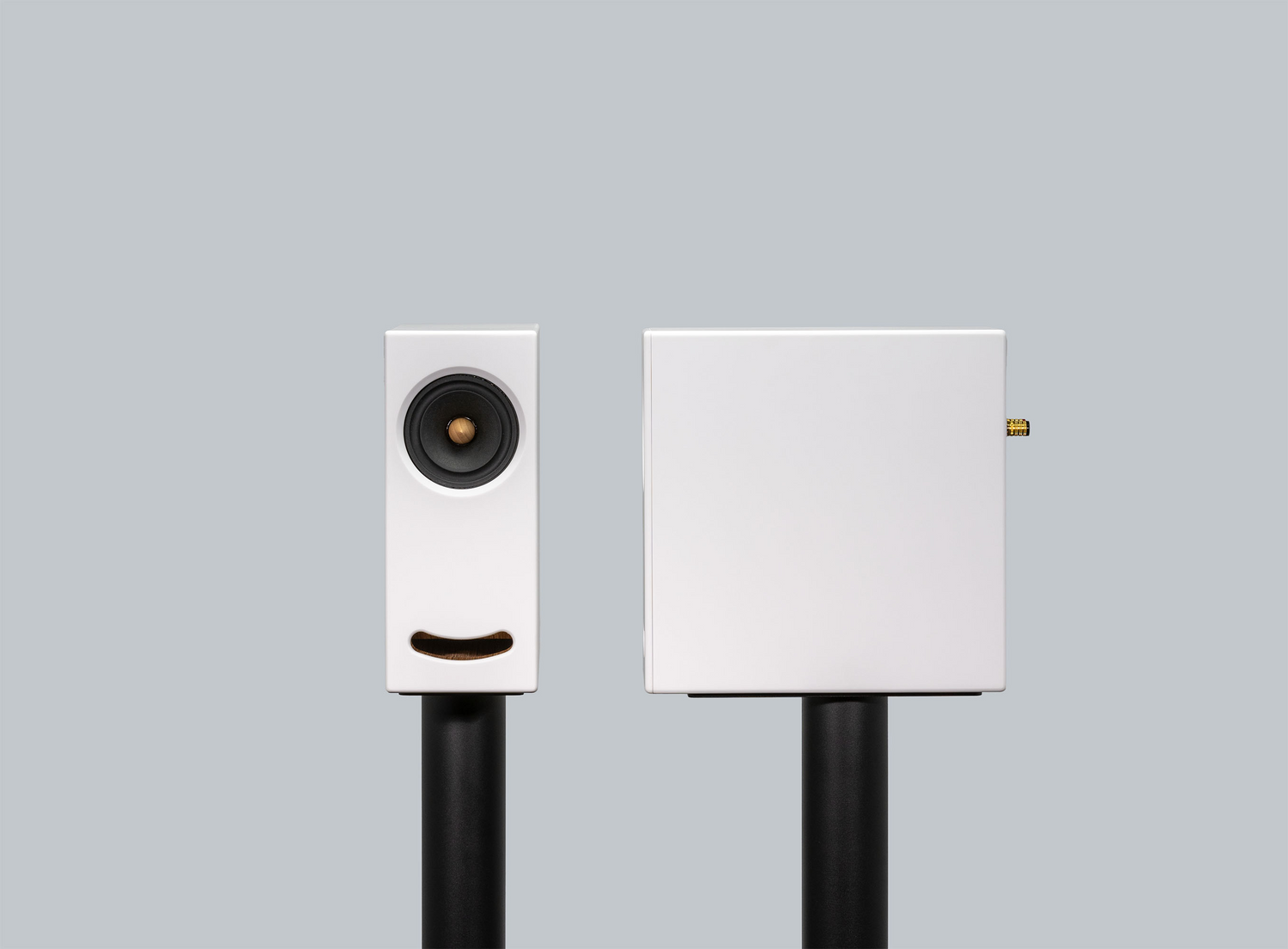 Closer Acoustics OGY White acrylic stone loudspeakers – detailed close-up of stylish black finish.