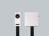 Closer Acoustics OGY White acrylic stone loudspeakers – detailed close-up of stylish black finish.