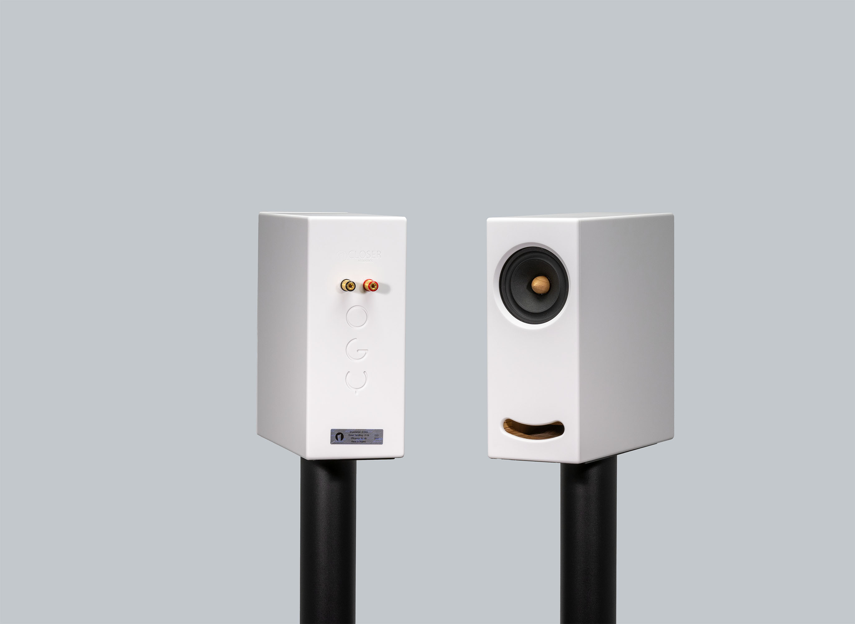 OGY White Corian speakers by Closer Acoustics – elegant and high-performance audio solution.