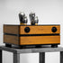 Closer Acoustics 300B Provocateur Signature amplifier in Iroko finish, placed on a wooden table, highlighting its refined design and premium build quality.