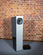 Closer Acoustics Allegra EX loudspeakers with field coil technology – pair – front view on brick wall background