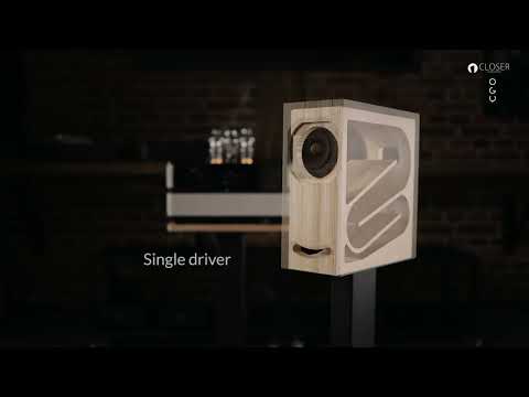Closer Acoustics OGY loudspeaker promotional shot – featuring internal transmission line design, highlighting precision craftsmanship